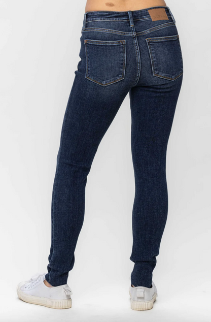 Mid Rise Vintage Raw Hem Skinny Jeans